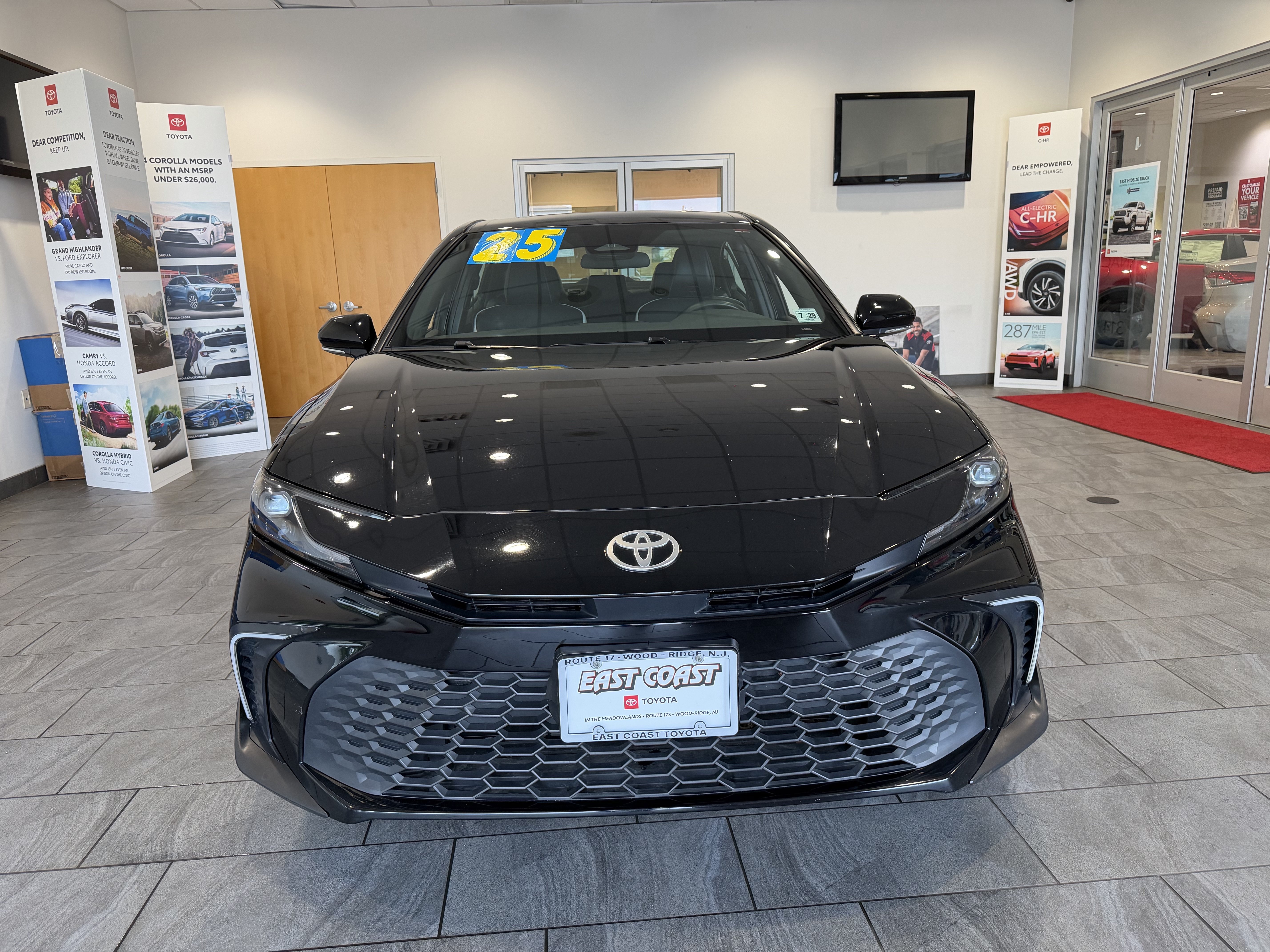 Used 2025 Black Toyota SE image 2