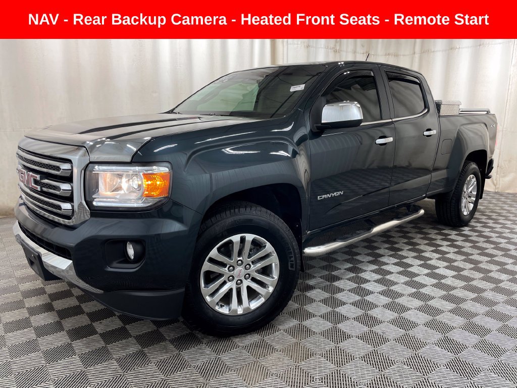 Used 2017 DARK SLATE METALLIC GMC 4WD SLT image 1