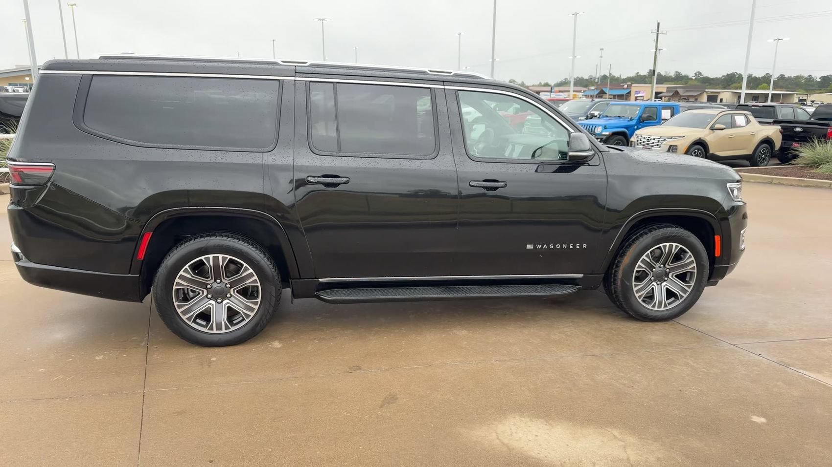 Used 2024 Diamond Black Crystal Pearlcoat Jeep Series II image 2