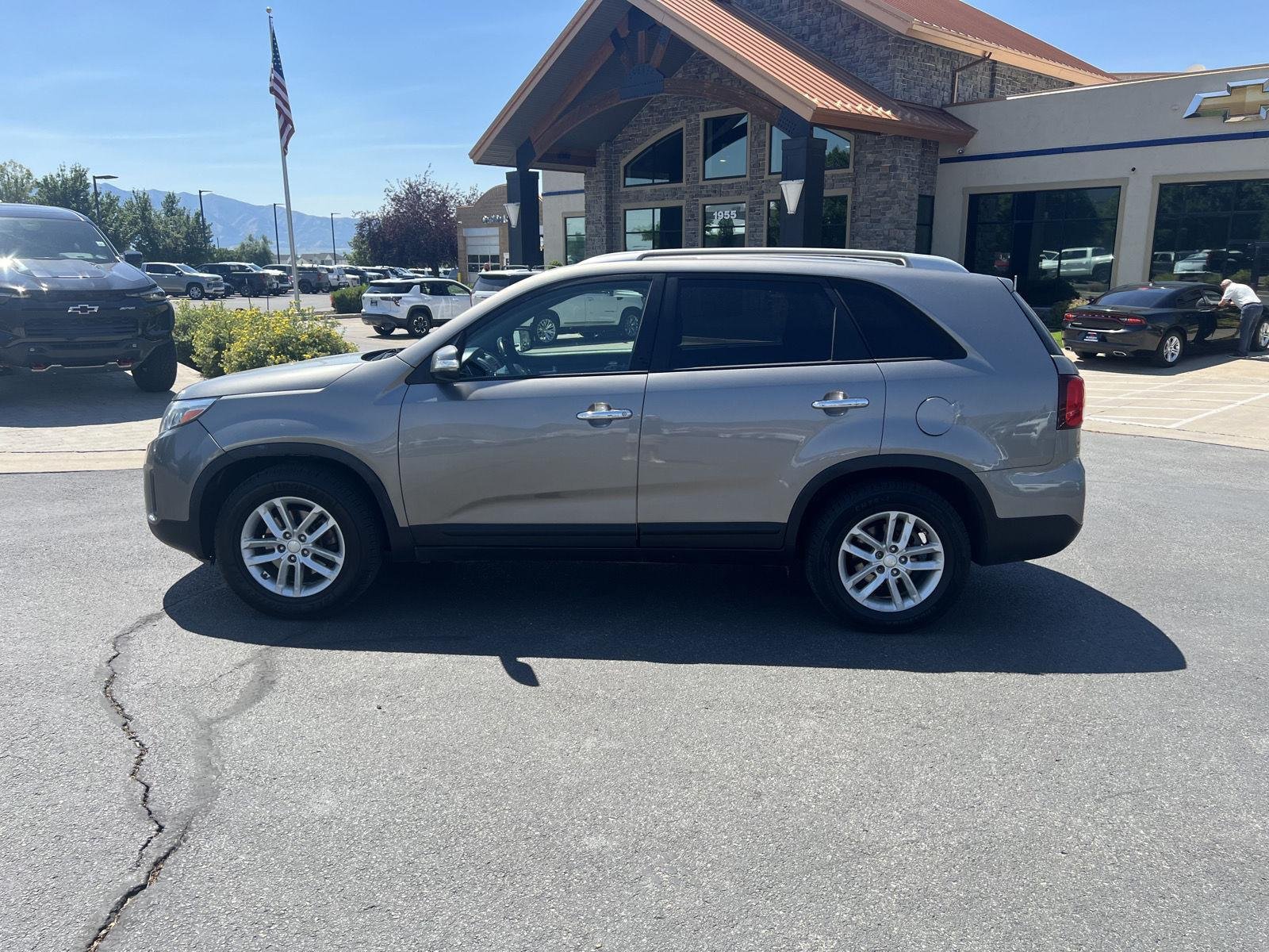 Used 2014 Kia Sorento LX with VIN 5XYKTCA61EG496657 for sale in Logan, UT