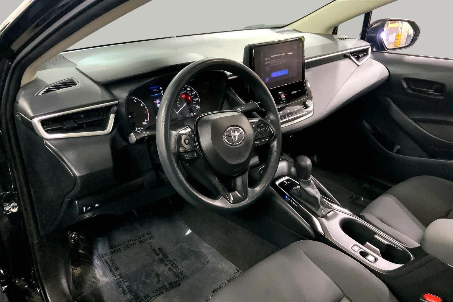 Used 2024 Midnight Black Metallic Toyota LE image 18