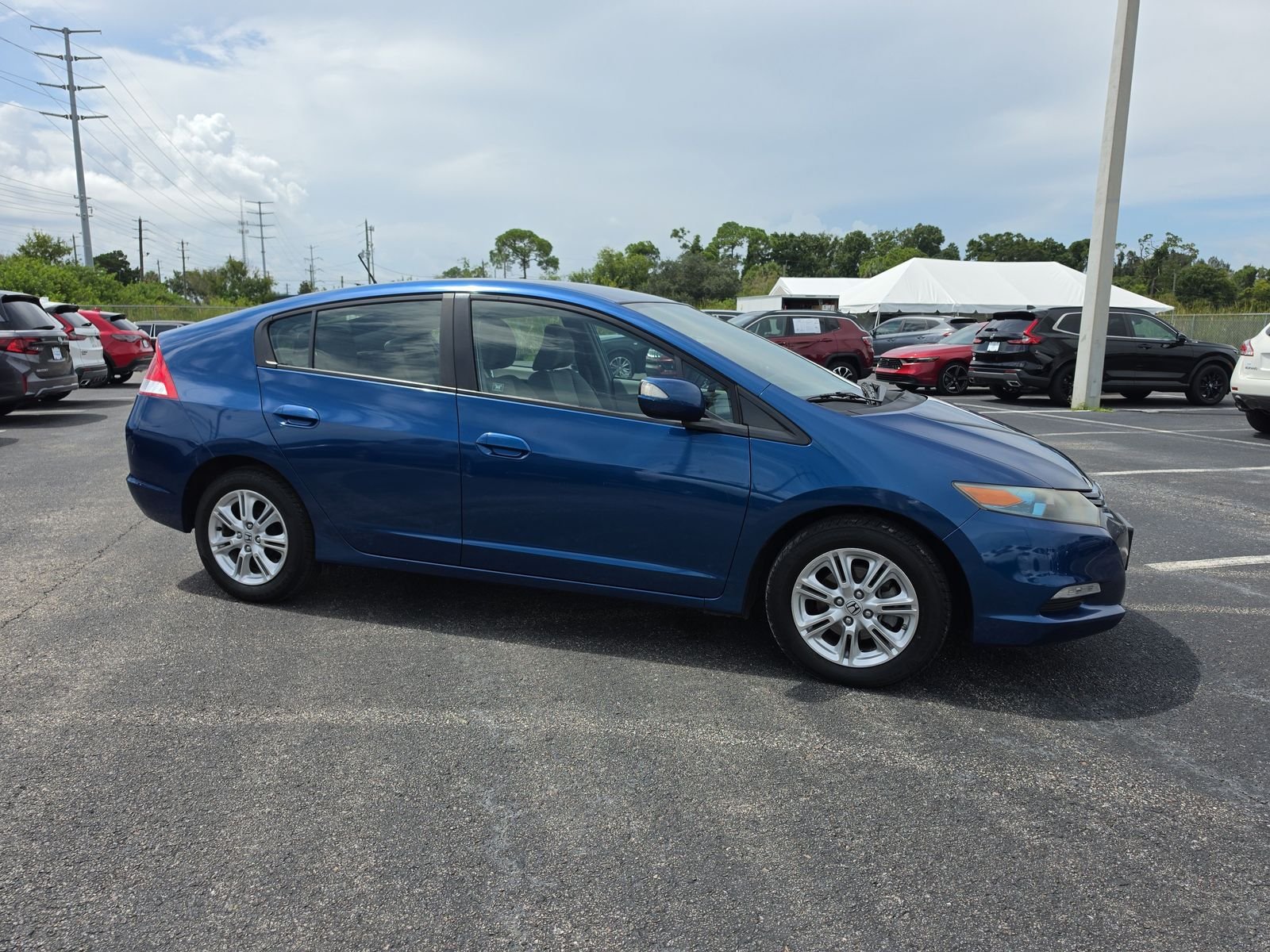 Used 2011 Honda Insight EX with VIN JHMZE2H7XBS002320 for sale in Port Richey, FL