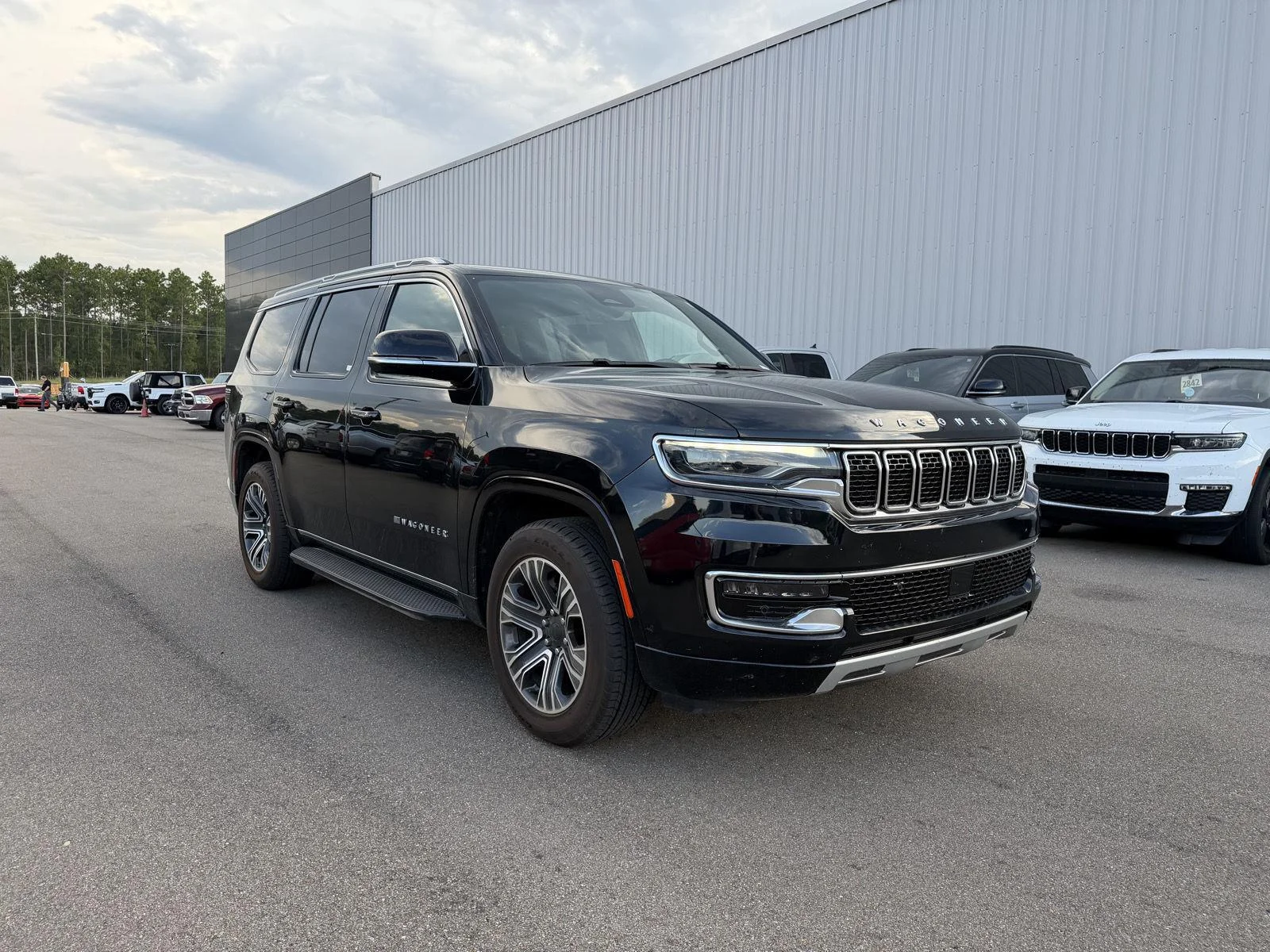 Used 2024 Diamond Black Crystal Pearlcoat Jeep Series II image 3