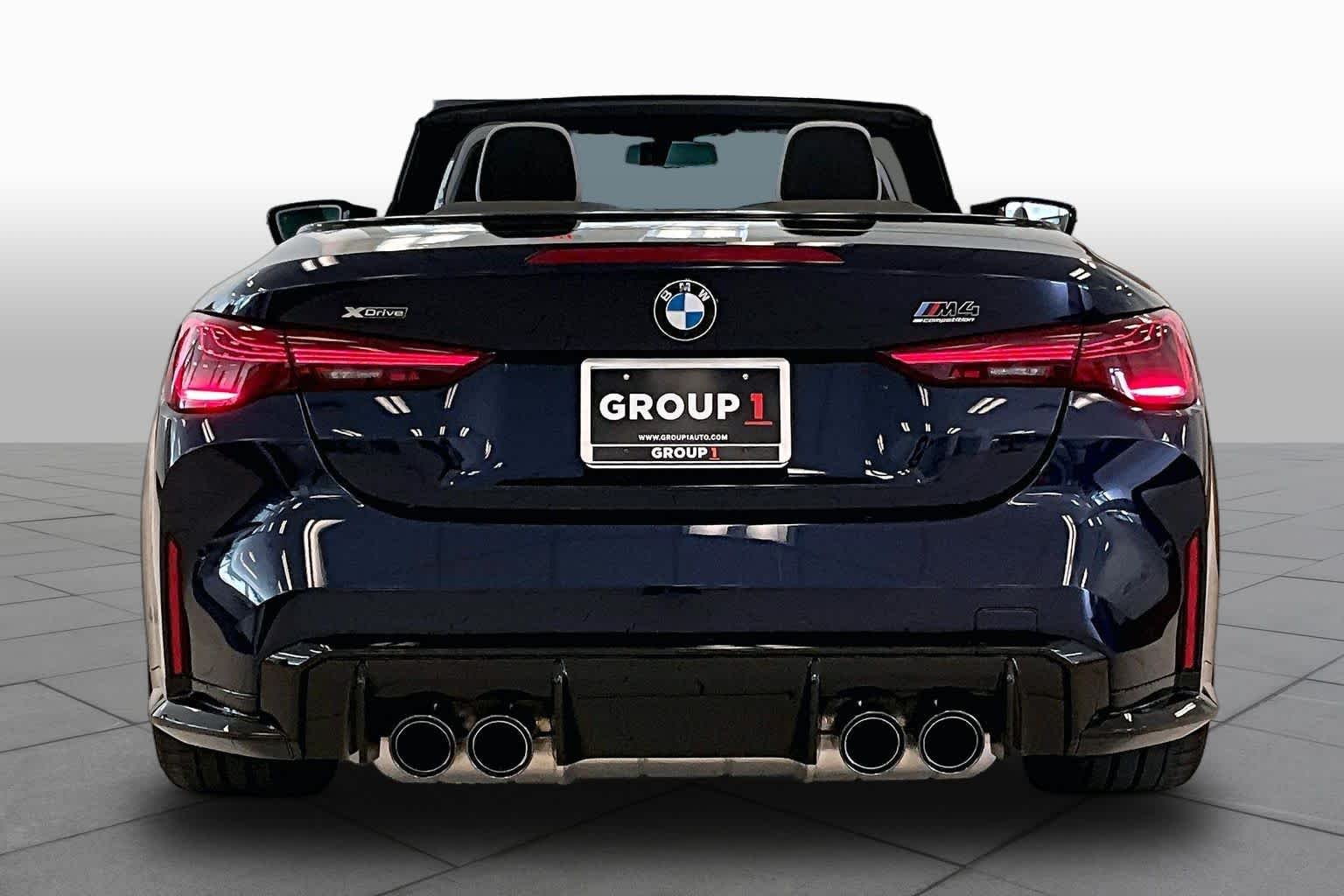 Used 2026 Tanzanite Blue II Metallic BMW Competition xDrive image 4