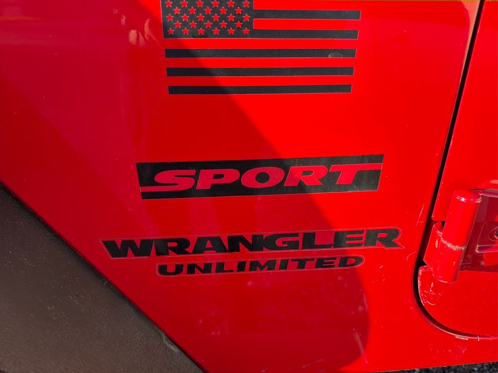 Used 2015 Firecracker Red Clear Coat Jeep Unlimited Sport image 11