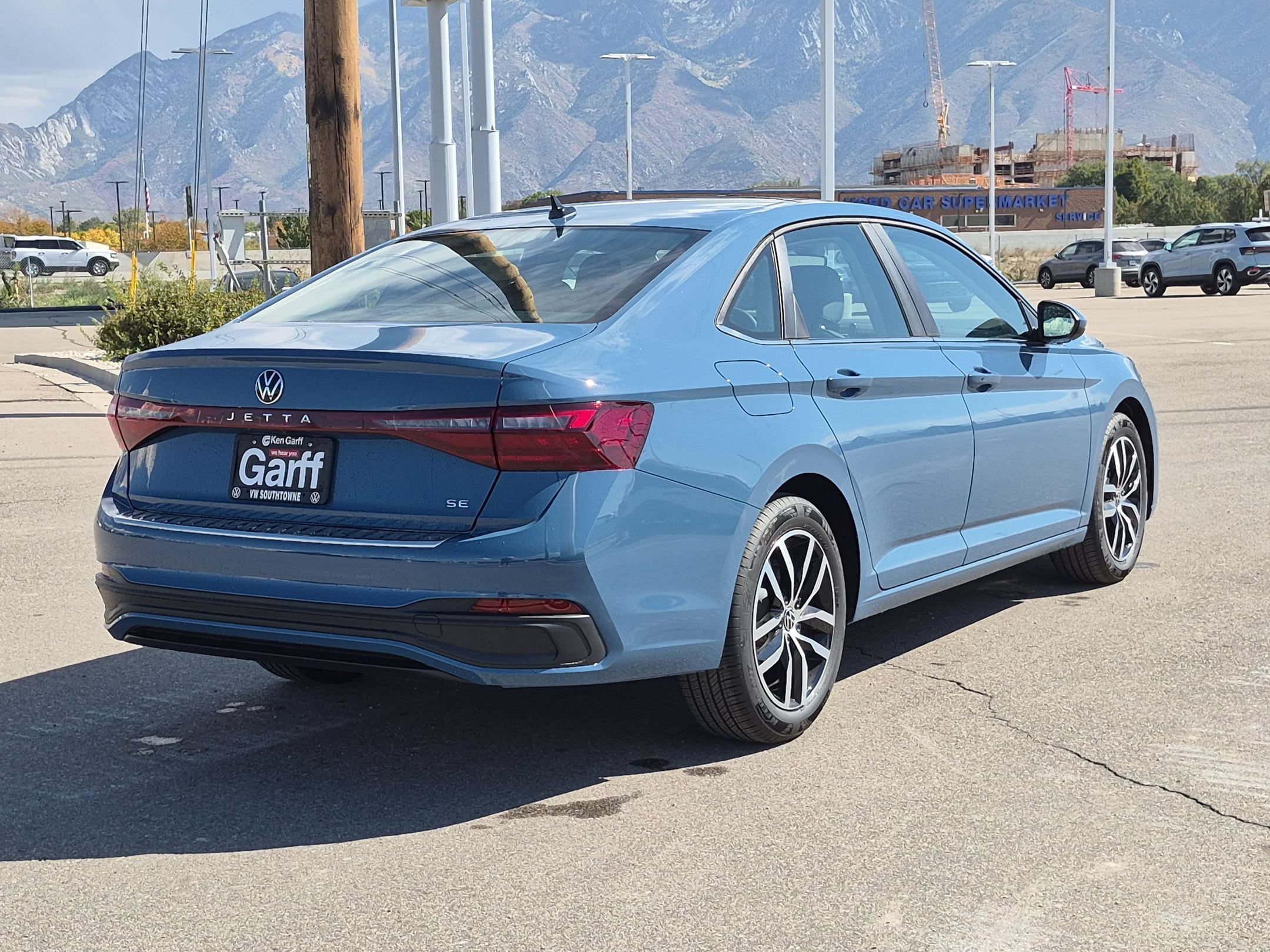 New 2027 Monterey Blue Pearl Volkswagen SE image 3