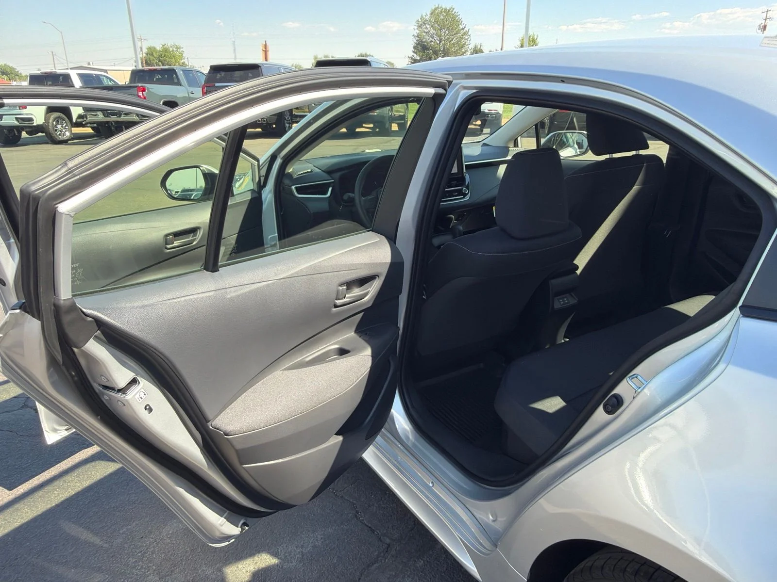 New 2026 Classic Silver Metallic Toyota Hybrid LE image 25