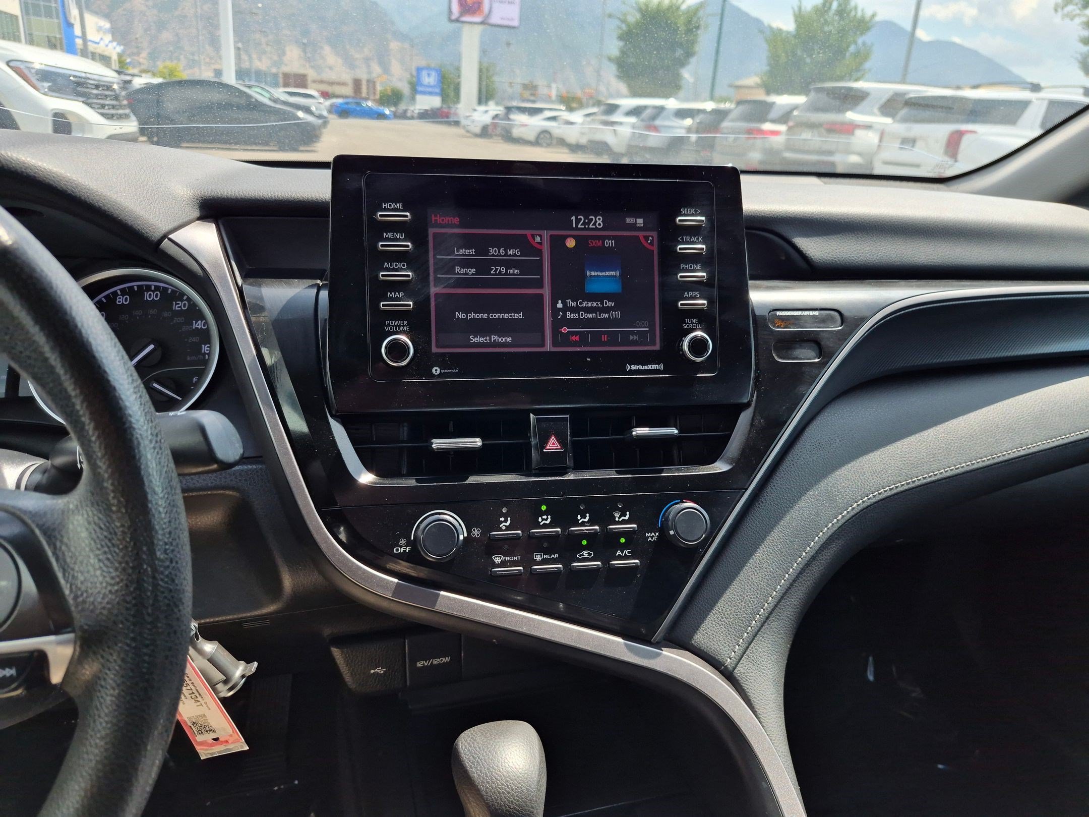 Used 2021 Celestial Silver Metallic Toyota LE image 22