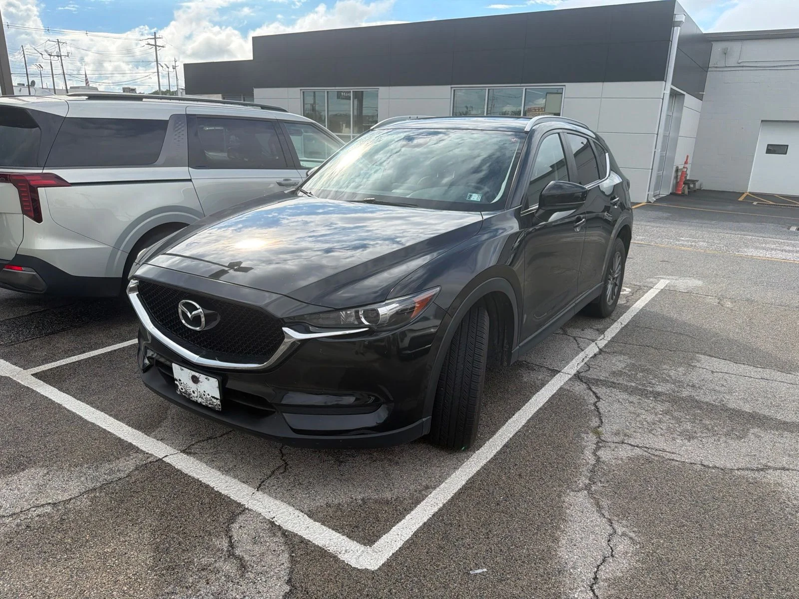 Used 2017 Black Mazda Touring image 1
