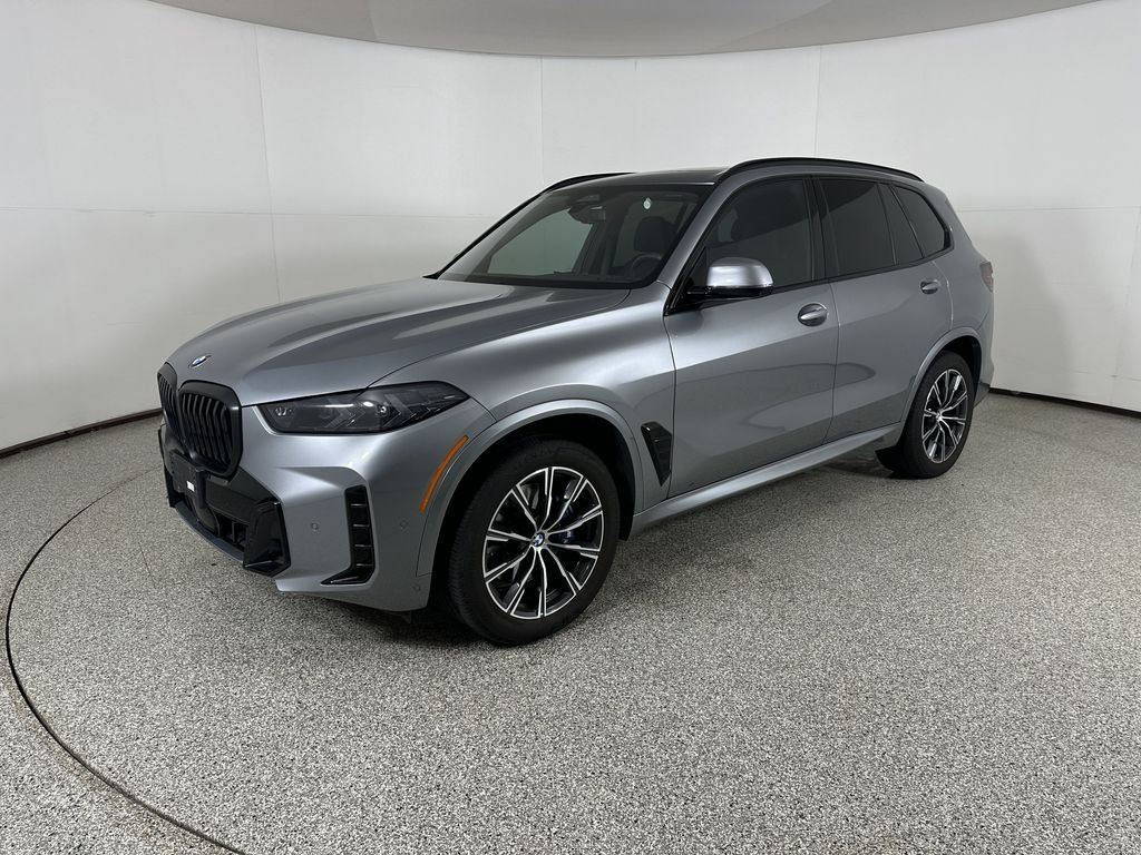 Certified Used 2024 Skyscraper Grey Metallic BMW xDrive40i image 1
