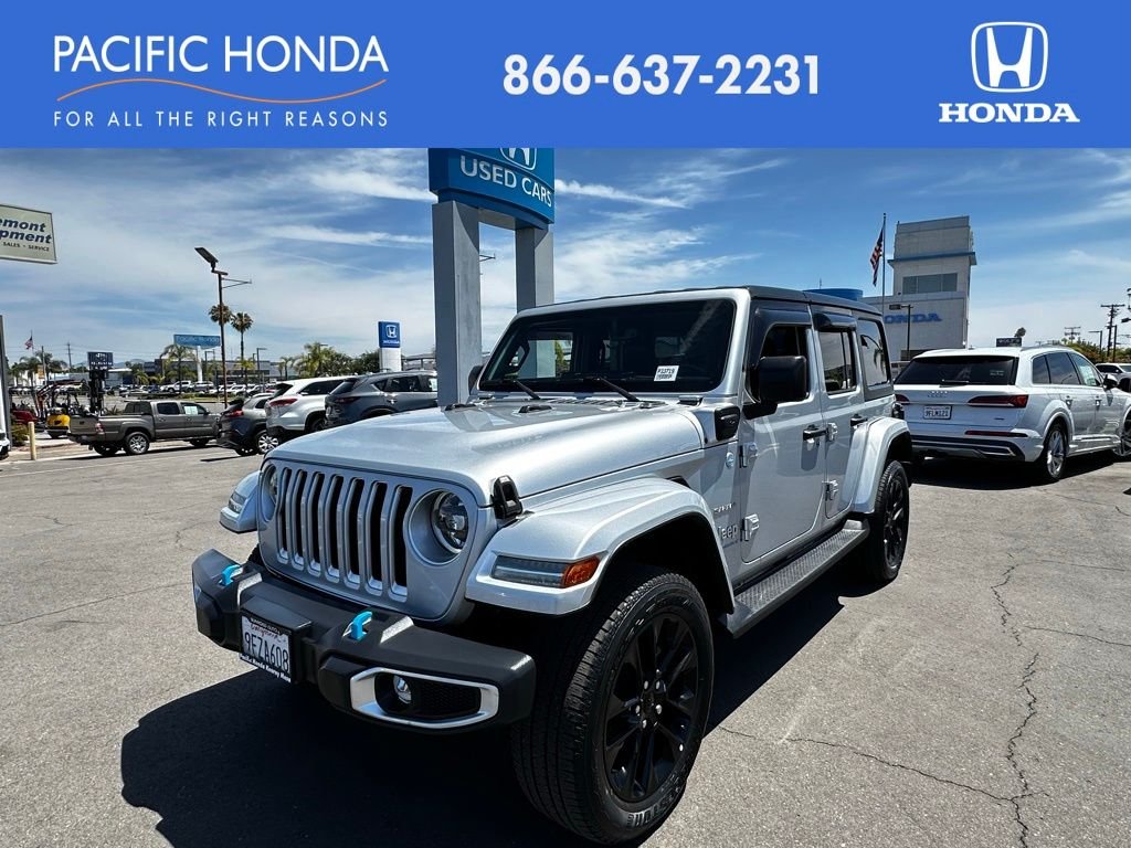 Used 2023 Silver Jeep Sahara 4xe image 1