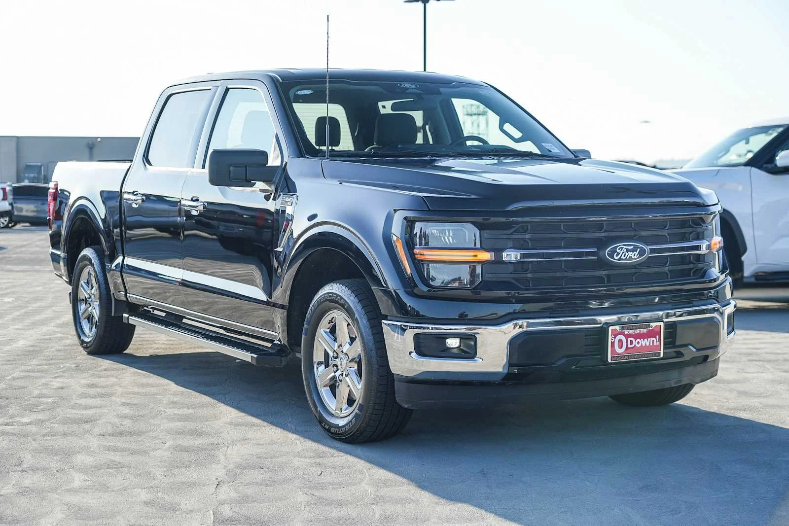 Used 2025 Agate Black Metallic Ford XLT image 4