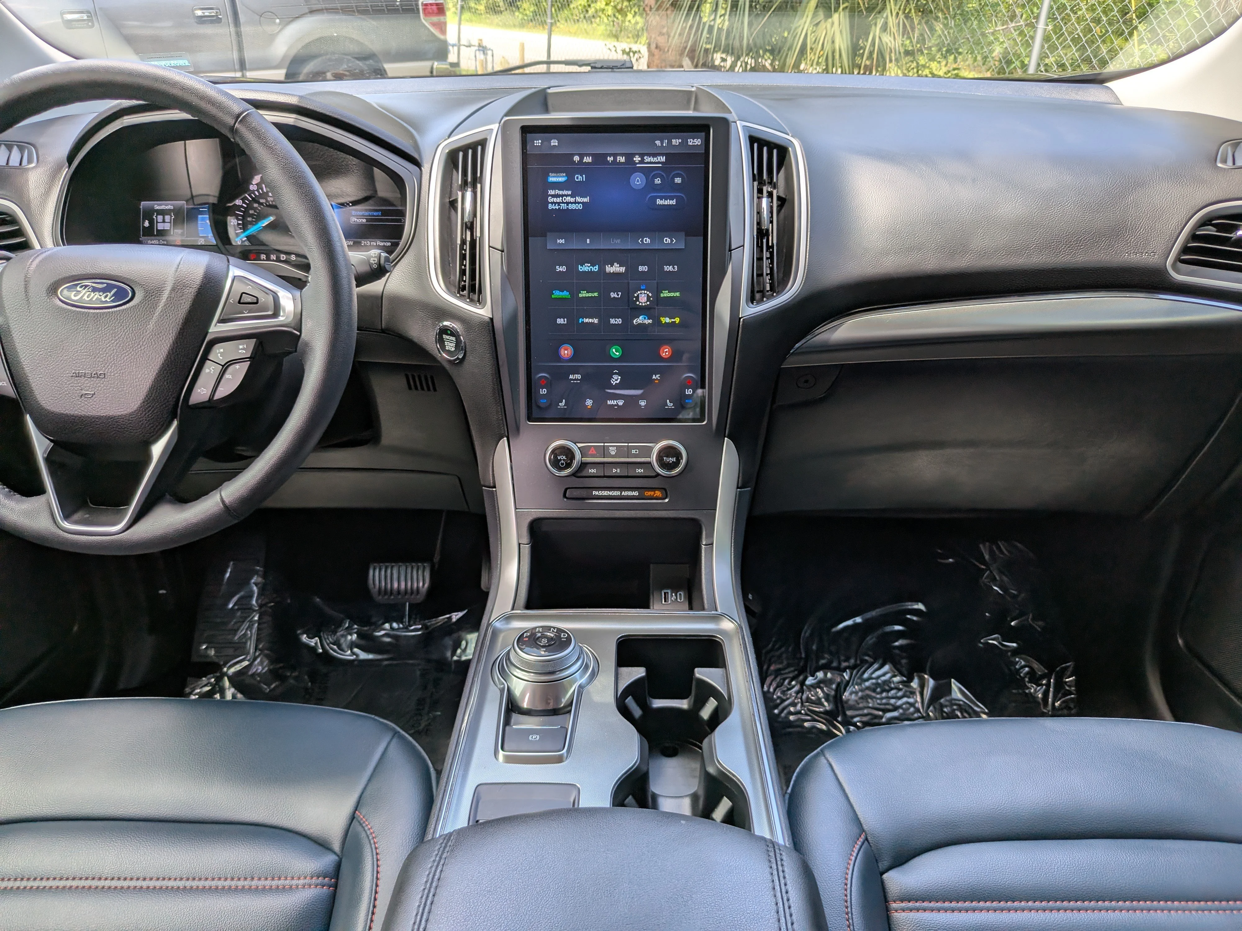 Used 2024 Agate Black Metallic Ford SEL image 21