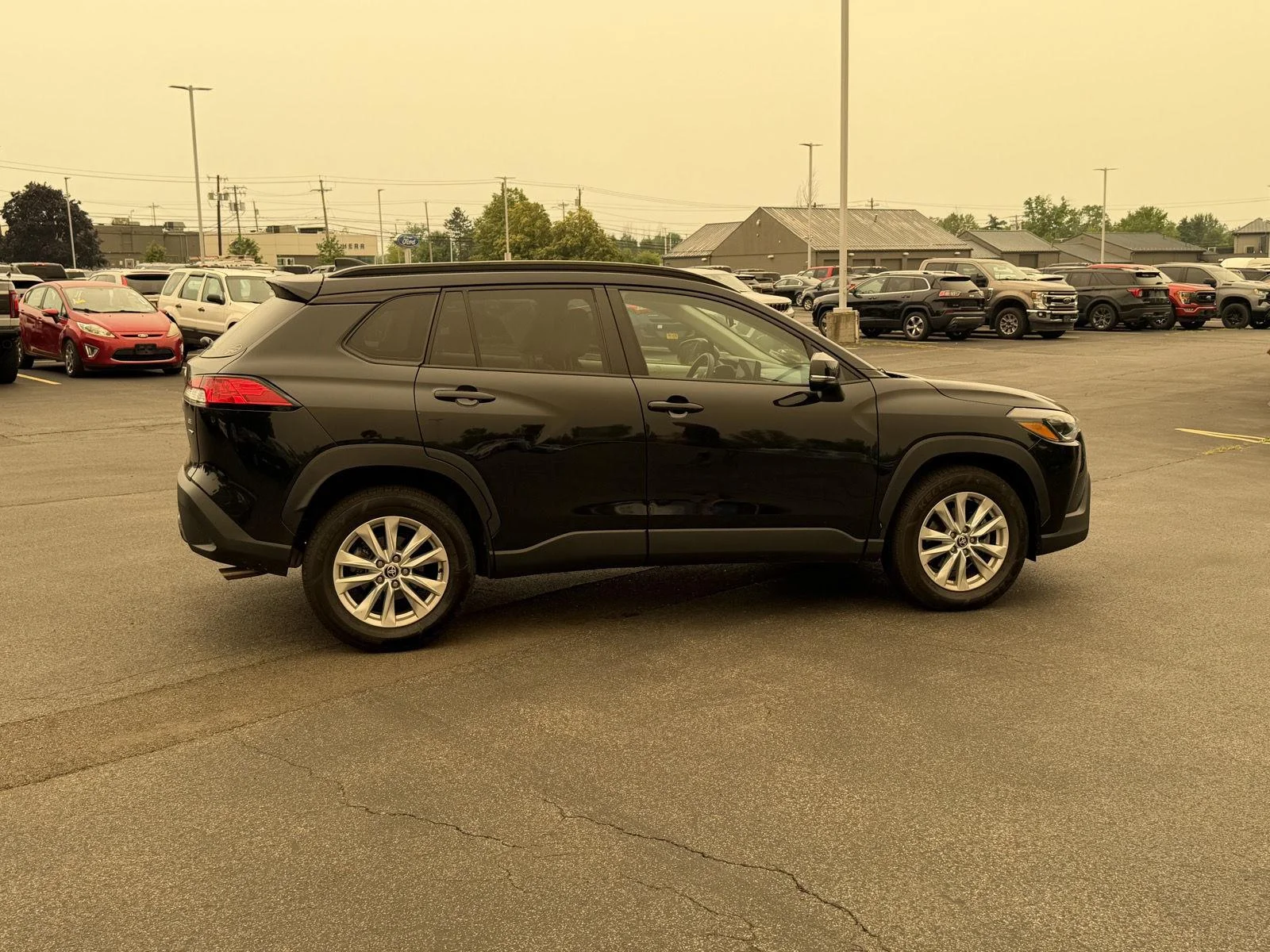 Used 2023 Jet Black Toyota LE image 4