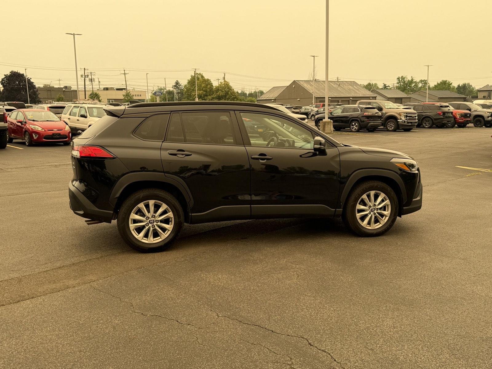 Used 2023 Jet Black Toyota LE image 4