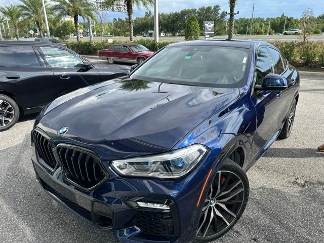 Used 2021 Tanzanite Blue II Metallic BMW M50i image 1