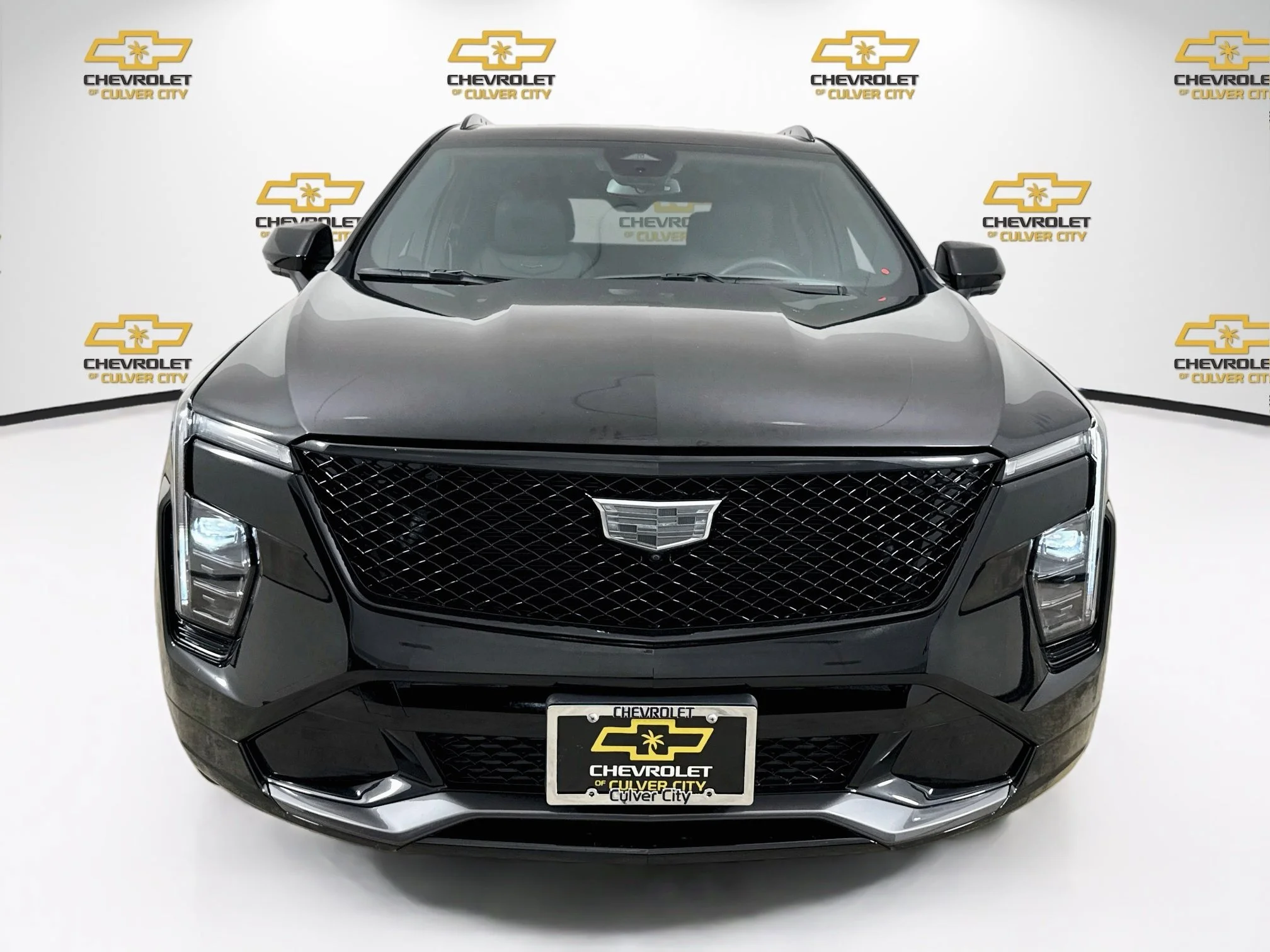 Used 2025 Stellar Black Metallic Cadillac Sport image 2