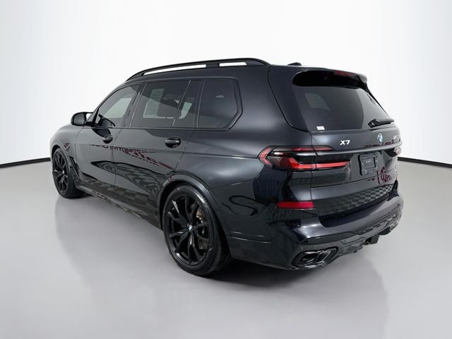 Certified Used 2025 Black Sapphire Metallic BMW M60i image 5
