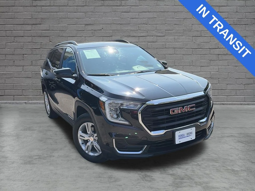 Used 2024 Ebony Twilight Metallic GMC SLE image 1