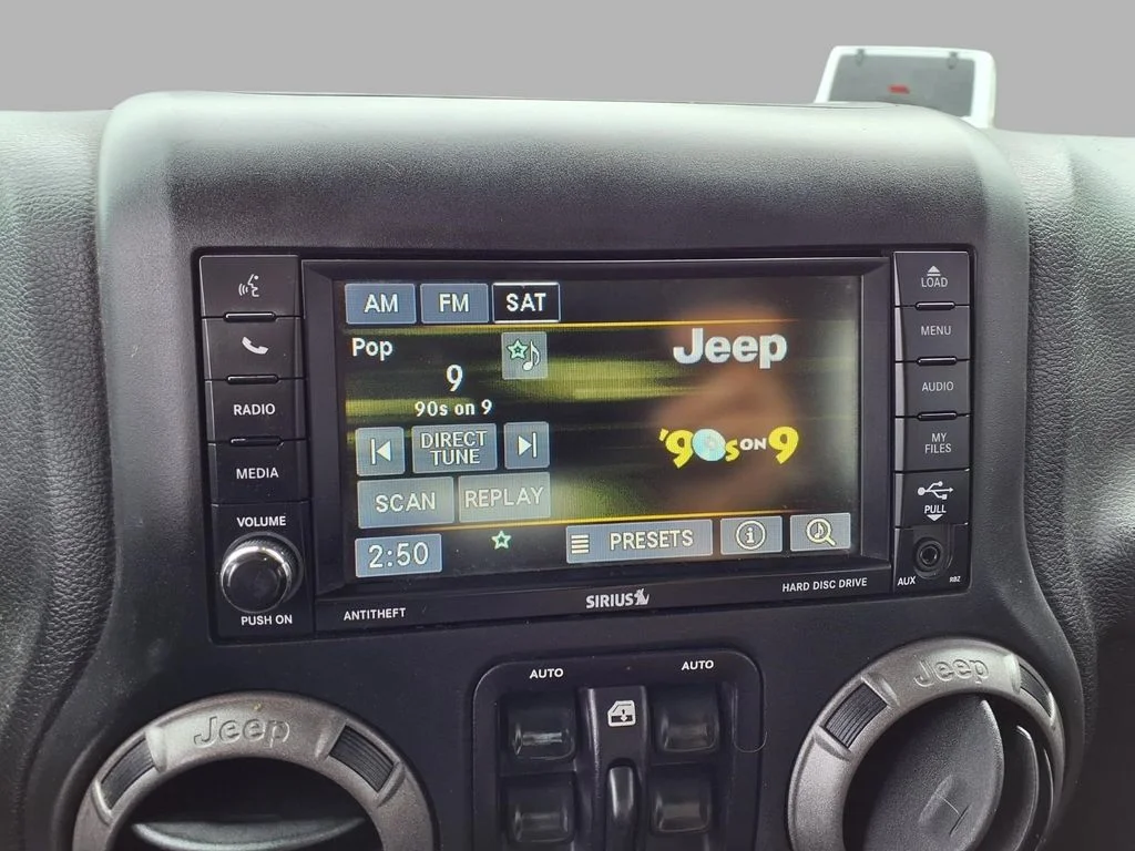Used 2016 Blue Jeep Unlimited Sport image 5