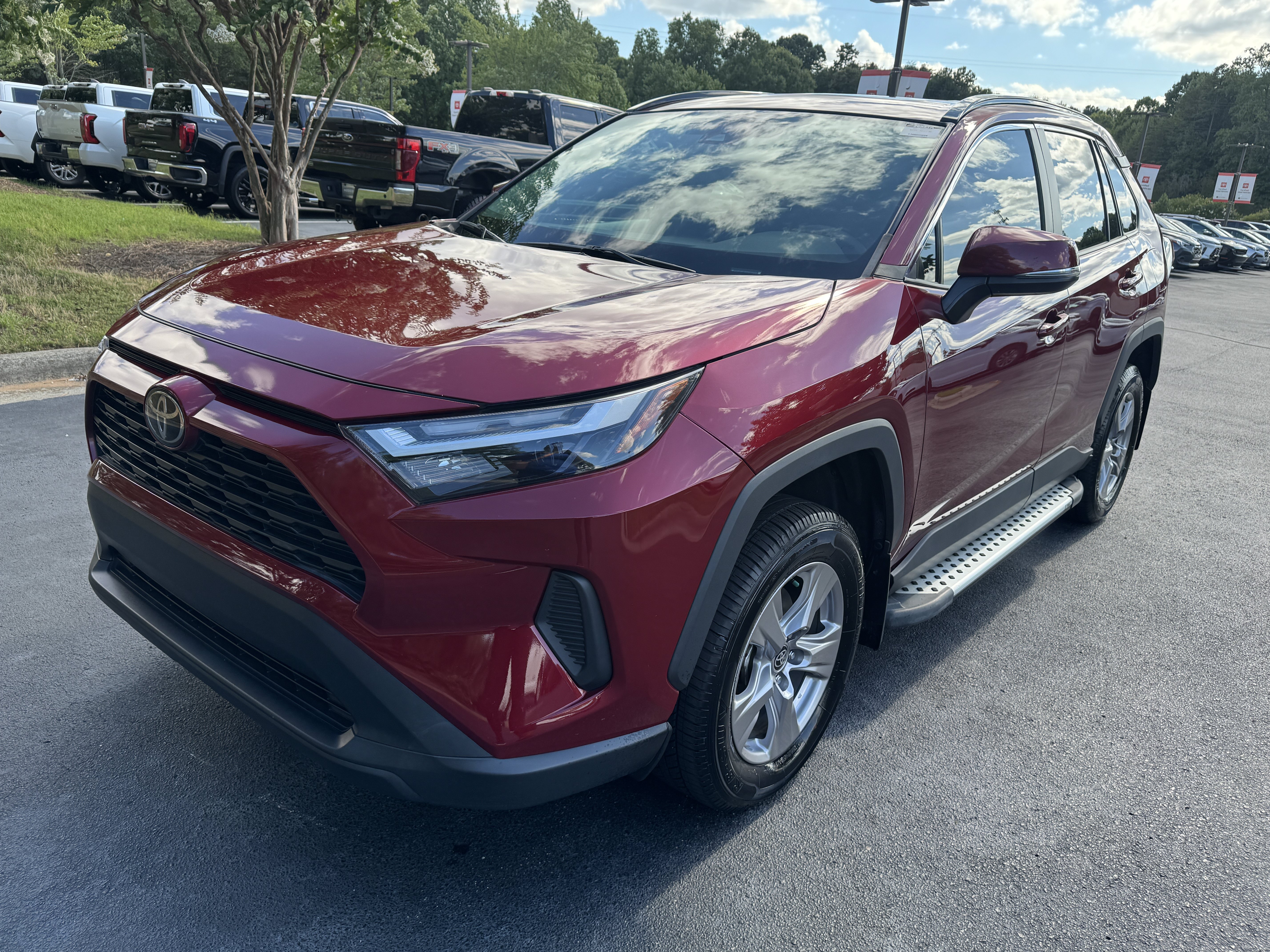 Certified Used 2022 Ruby Flare Pearl Toyota XLE image 1
