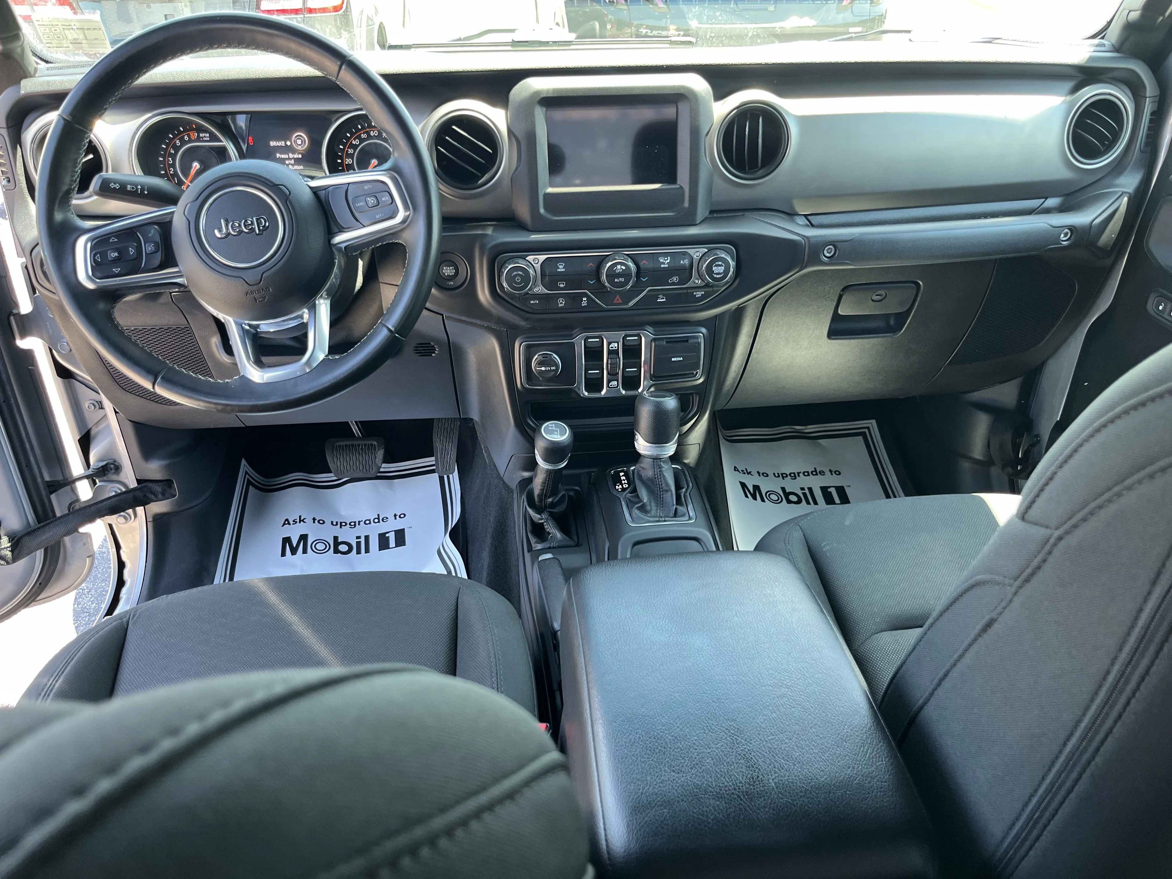 Used 2020 Billet Silver Metallic Jeep Sport image 19
