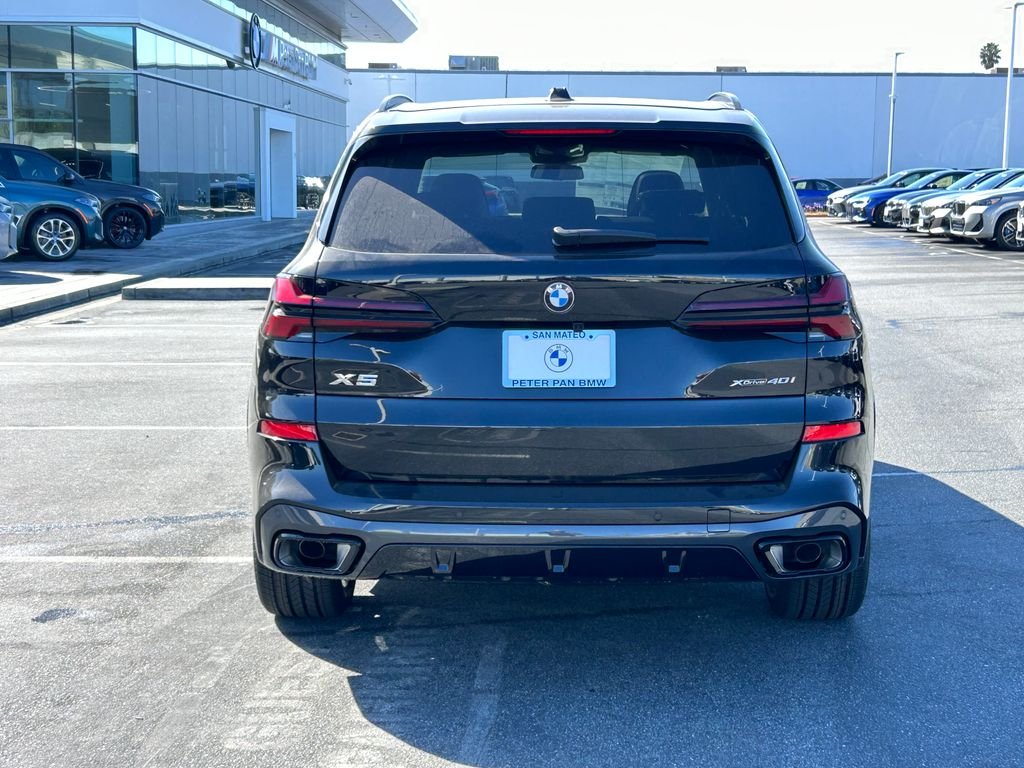 New 2026 Black Sapphire Metallic BMW xDrive40i image 4