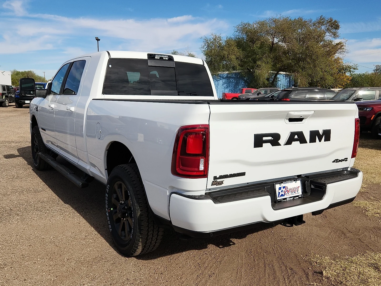 New 2026 PW7 Bright Whit Ram LARAMIE MEGA CAB 4X4 6