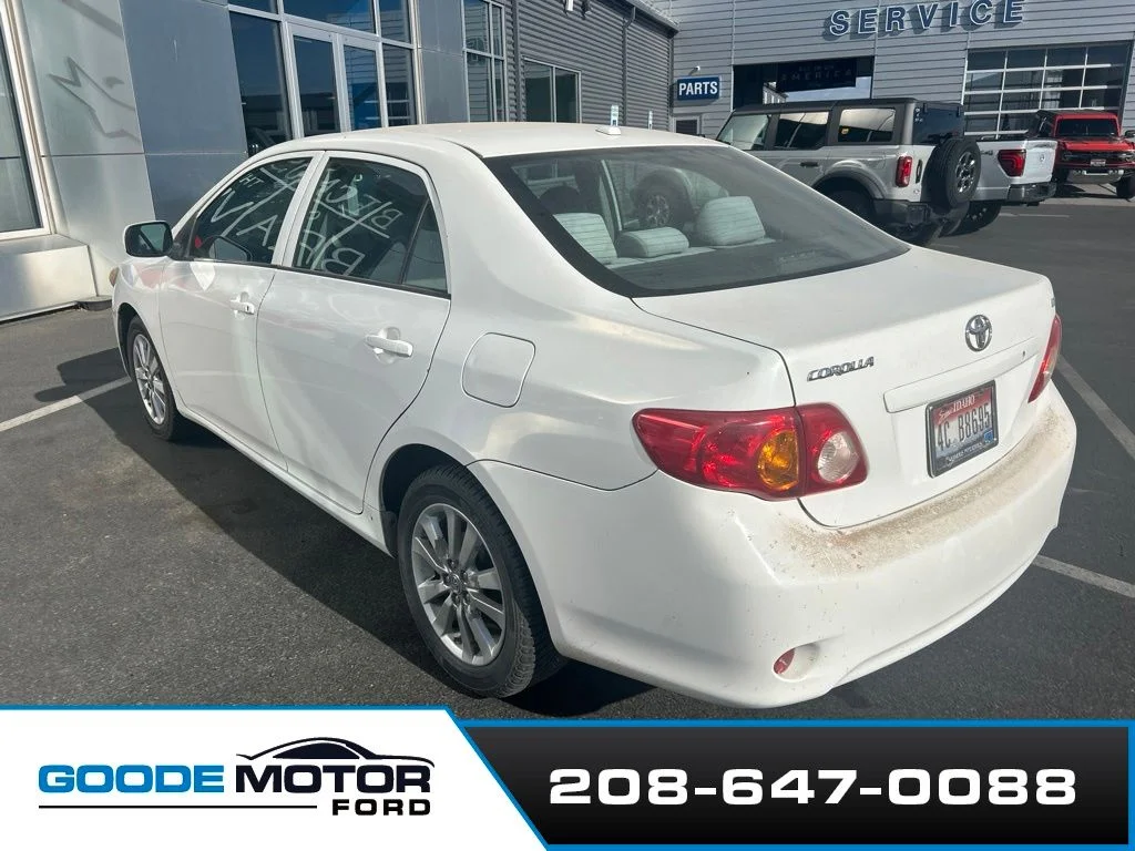 Used 2009 Super White Toyota LE image 2