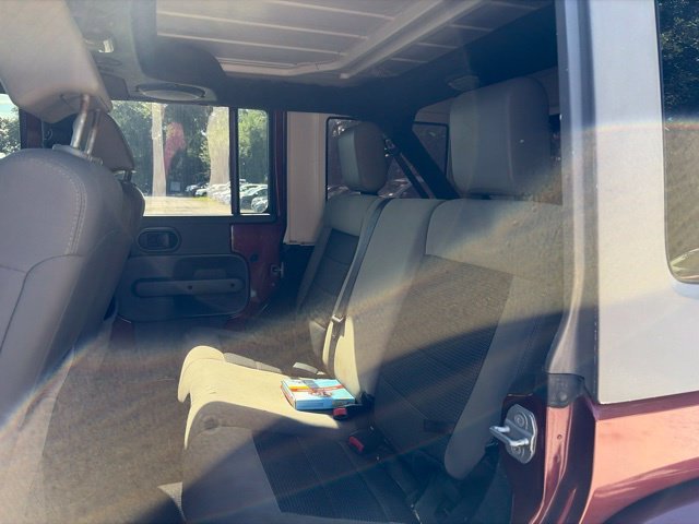Used 2010 Red Jeep Unlimited Sahara image 21