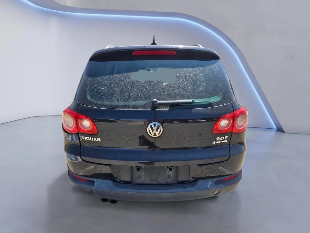Used 2011 Deep Black Metallic Volkswagen SE 4Motion image 4