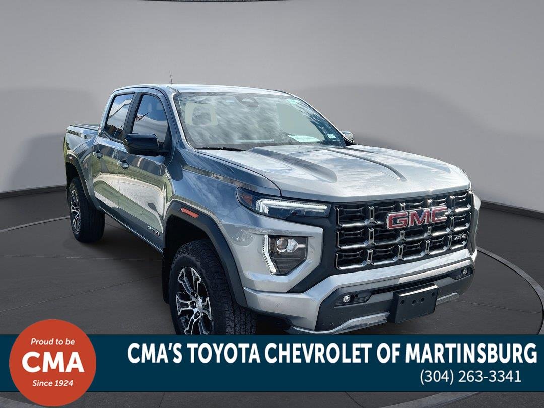 Used 2025 Sterling Metallic GMC 4WD AT4 image 1