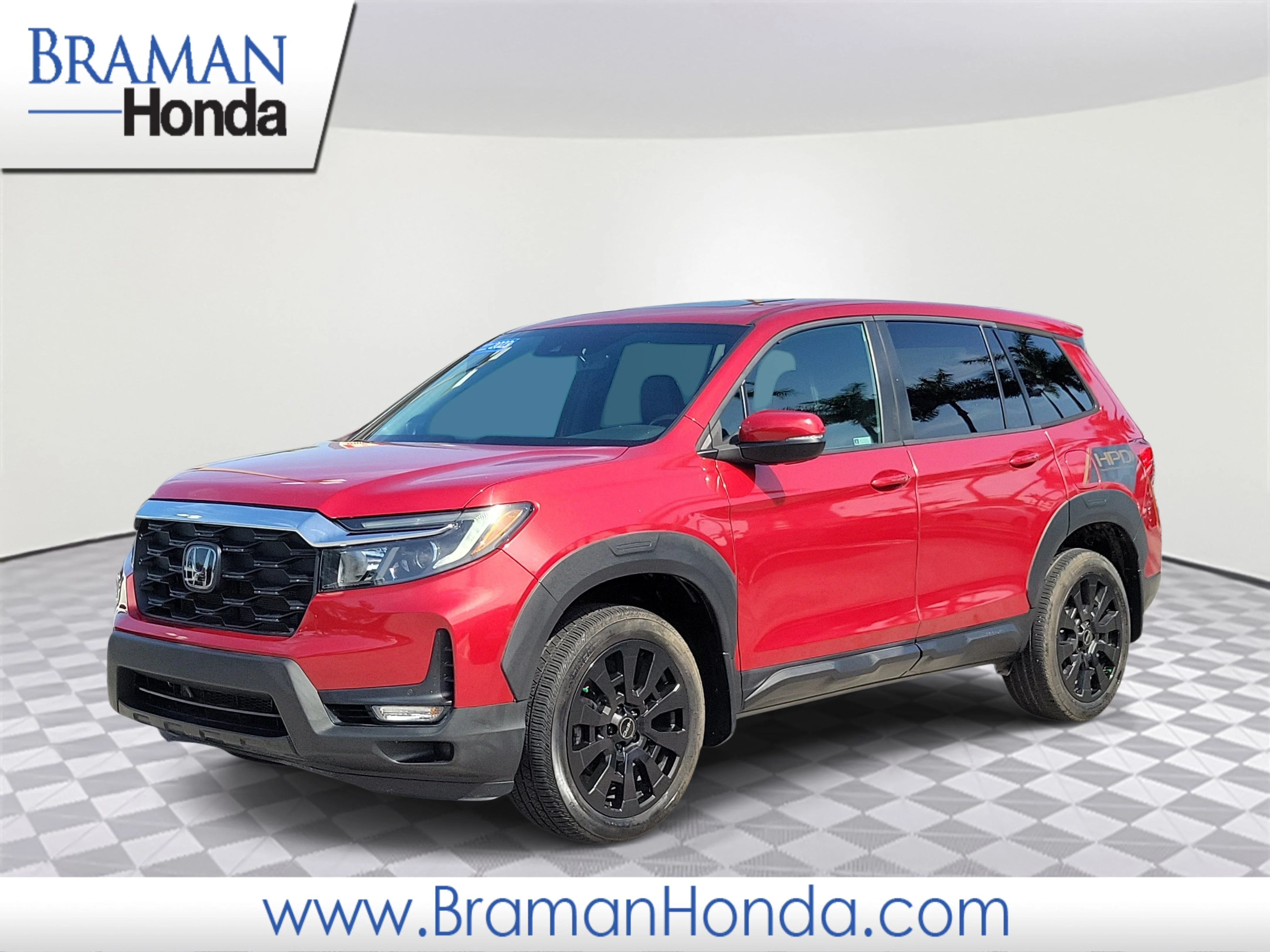 Used 2023 Radiant Red Metallic II Honda AWD EX-L image 1