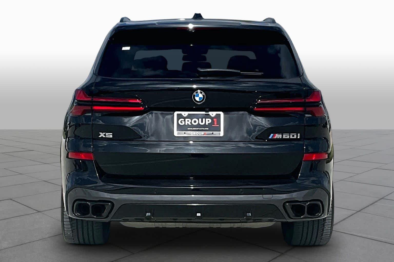 Certified Used 2024 Black Sapphire Metallic BMW M60i image 4