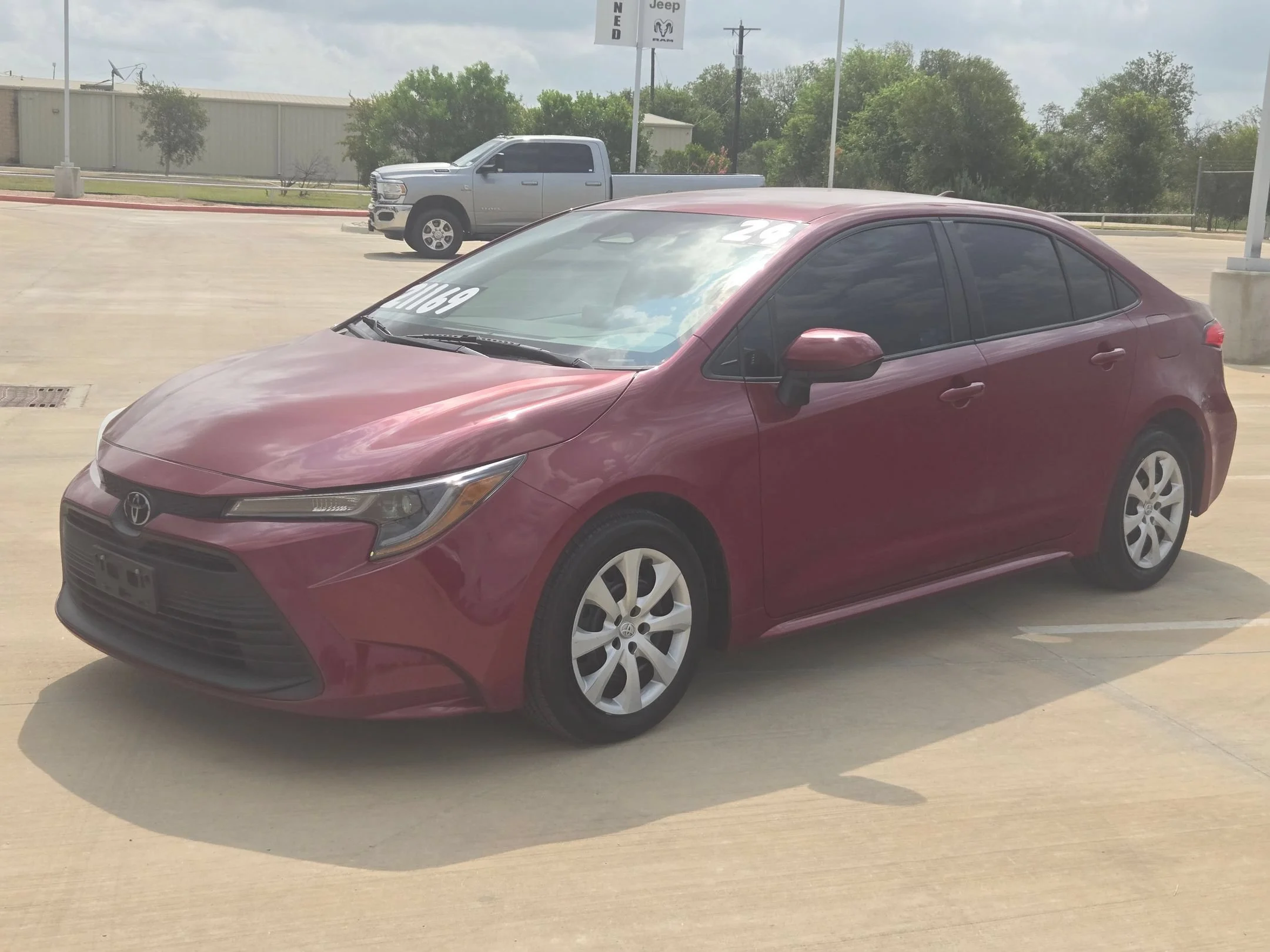 Used 2024 Red Toyota LE image 7