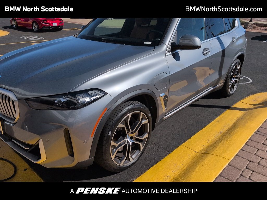 Certified Used 2024 Gray Metallic BMW xDrive50e image 1