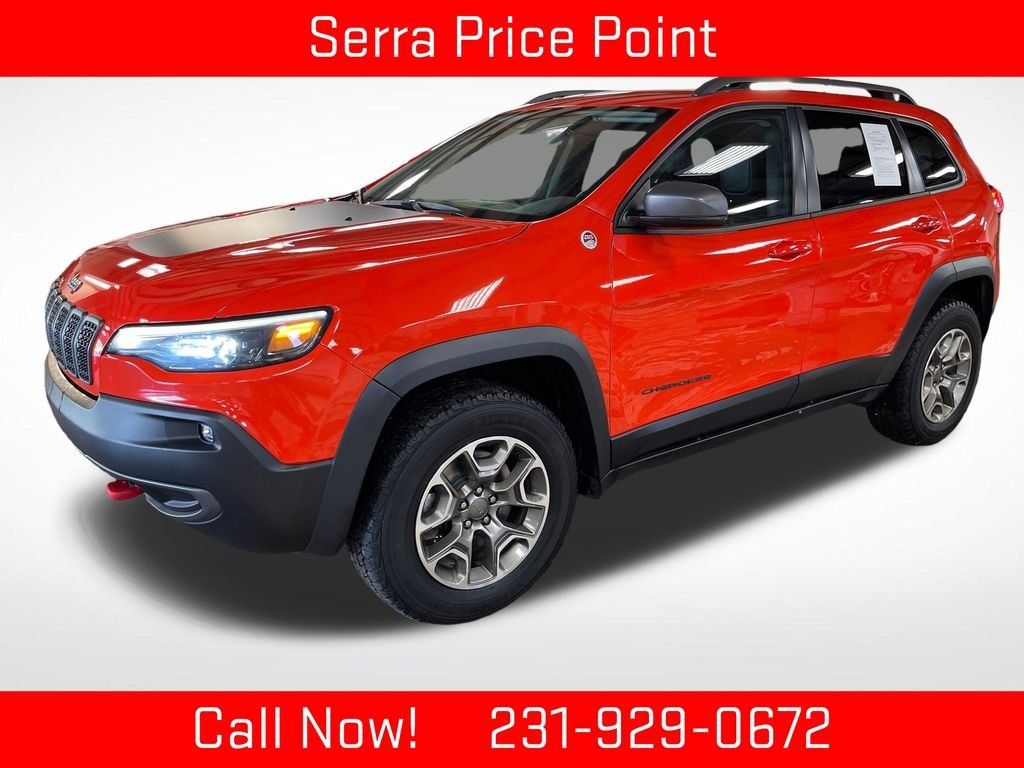 Certified Used 2021 Orange Jeep Trailhawk image 1