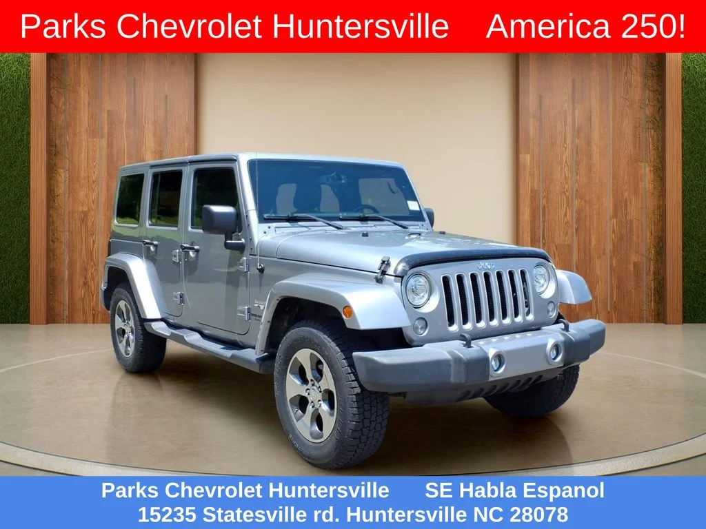 Certified Used 2017 Silver Jeep Unlimited Sahara image 1