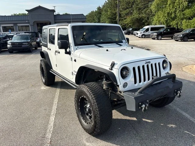 Used 2017 White Jeep Unlimited Sport image 1