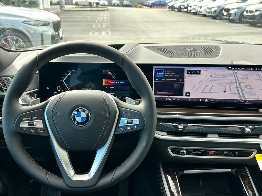 New 2026 Manhattan Green Metallic BMW xDrive50e image 17