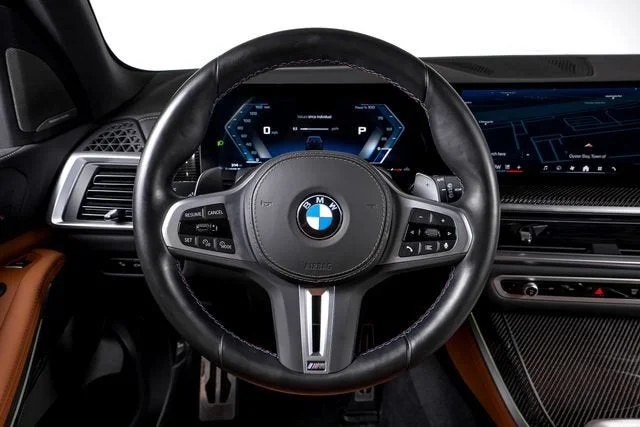 Used 2025 Black Sapphire Metallic BMW M60i image 40