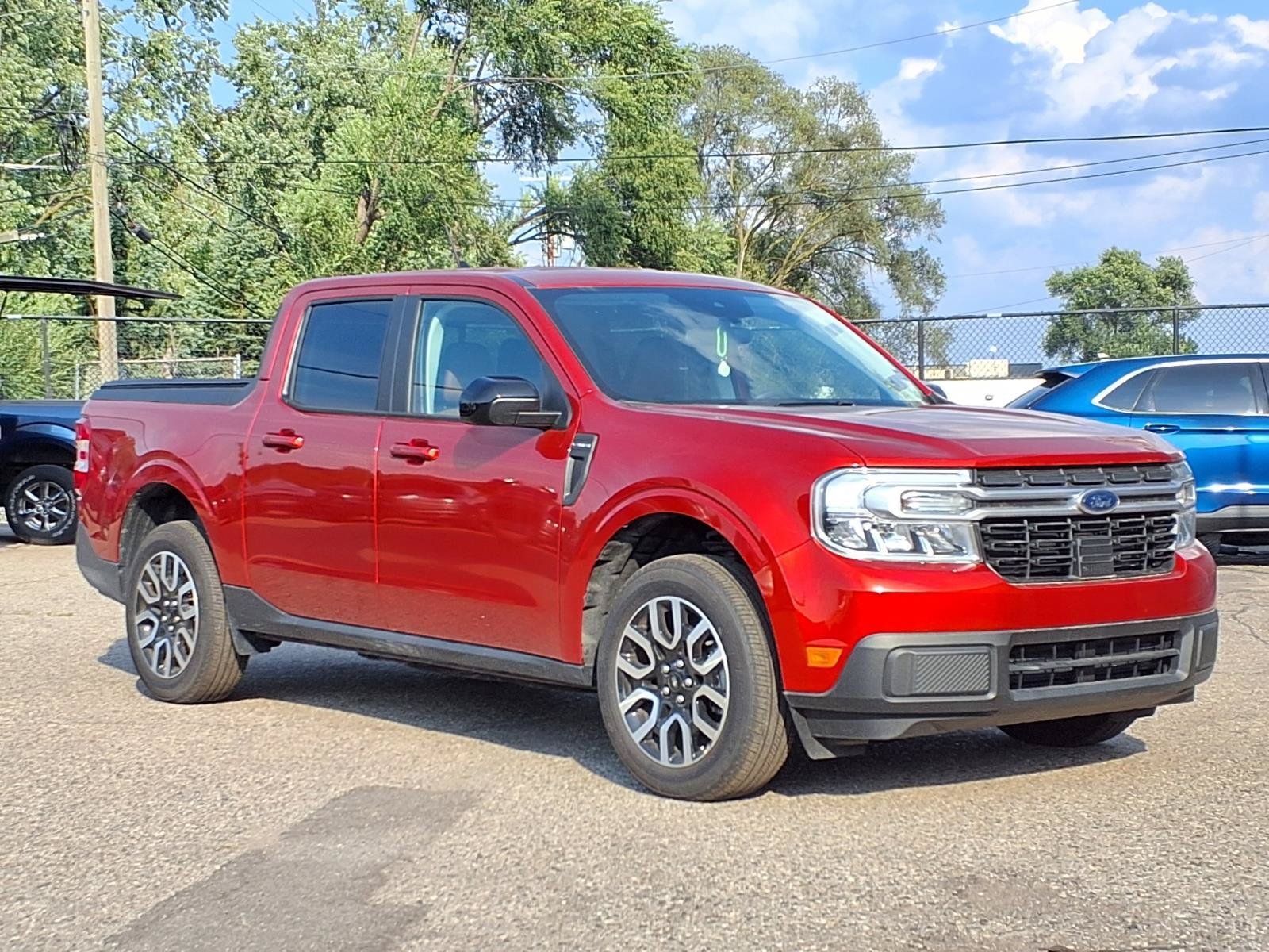Certified Used 2024 Hot Pepper Red Metallic Tinted Clearcoat Ford LARIAT image 1