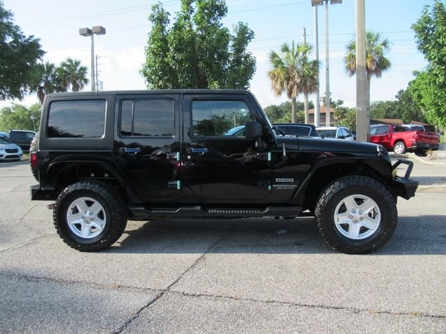 Used 2014 Jeep Wrangler Unlimited Sport with VIN 1C4BJWDG6EL115840 for sale in Mount Dora, FL