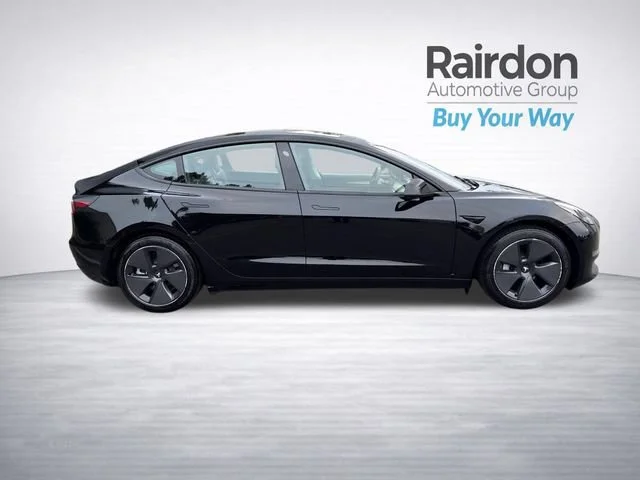 Used 2023 Solid Black Tesla Base image 8