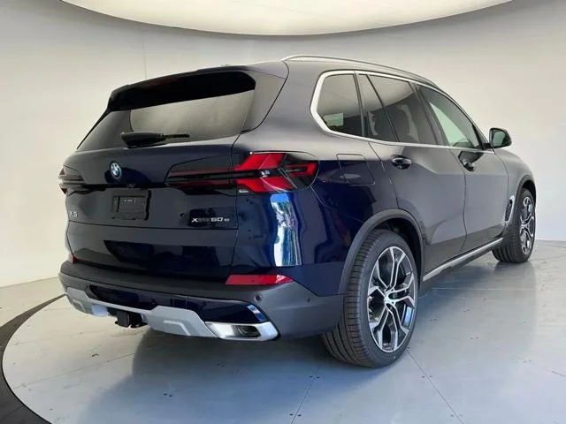 New 2026 Tanzanite Blue II Metallic BMW xDrive50e image 3