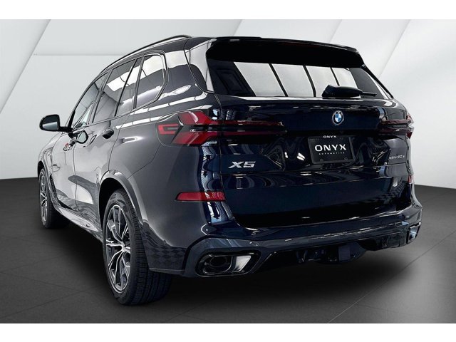 New 2026 Carbon Black Metallic BMW xDrive50e image 7