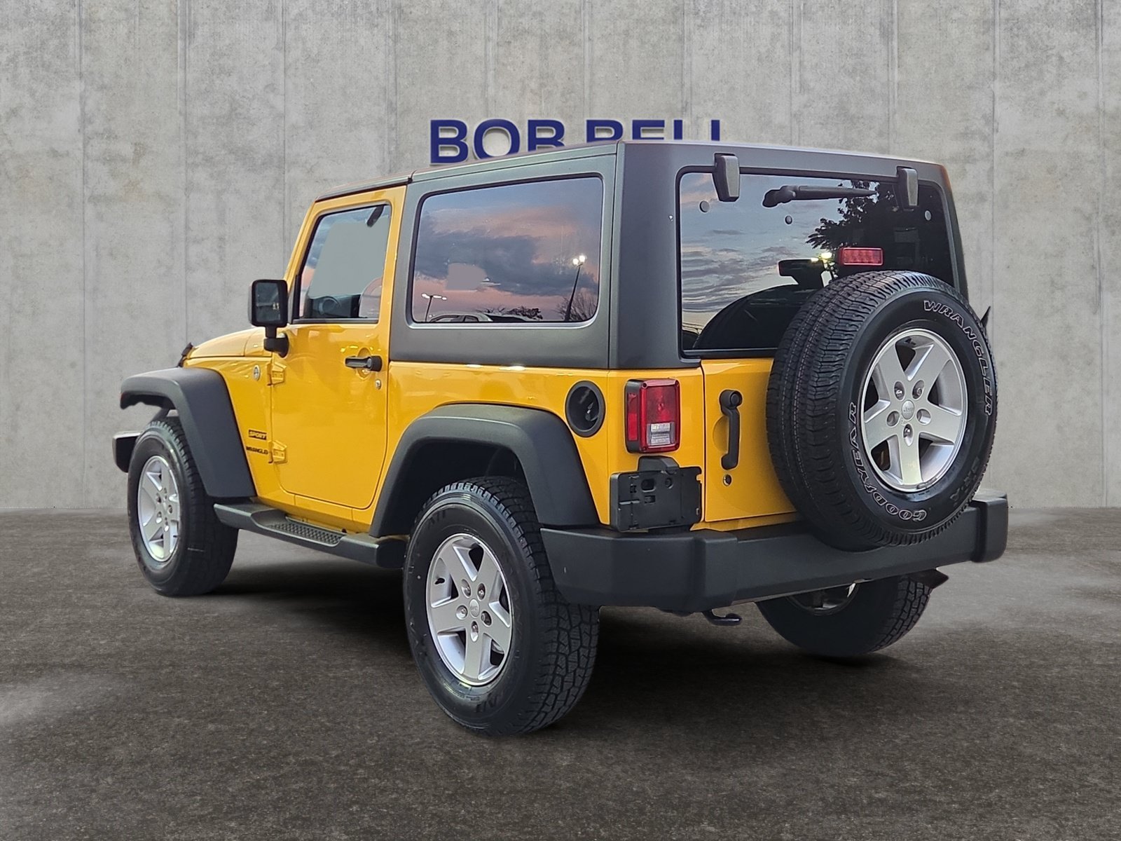 Used 2015 Baja Yellow Clearcoat Jeep Sport image 3