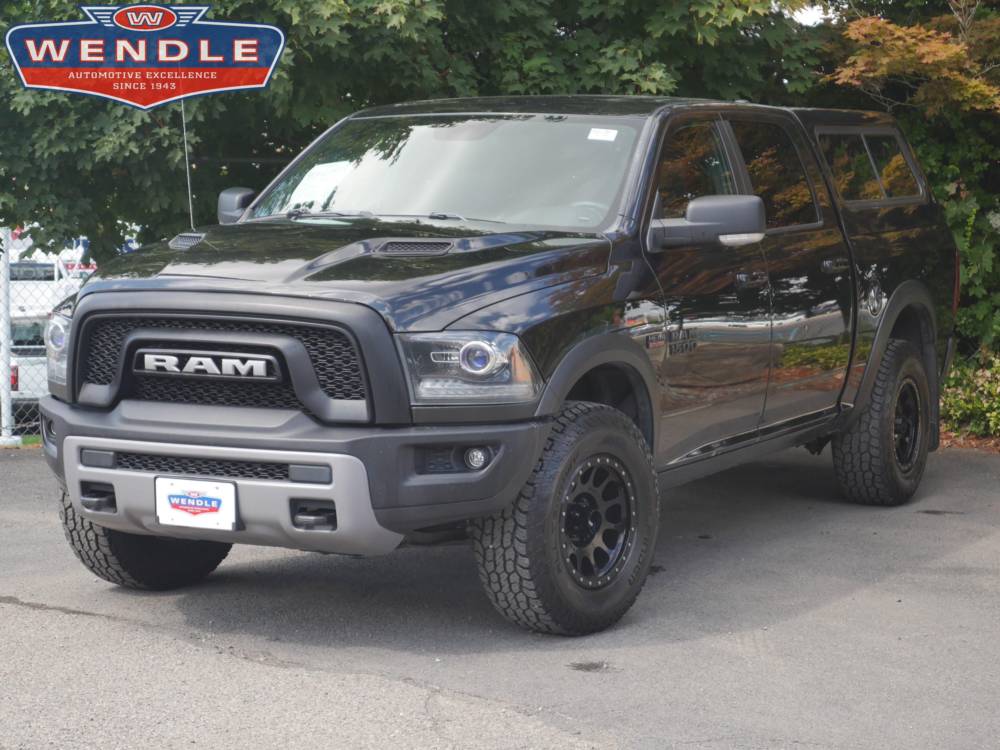 Used 2016 Brilliant Black Crystal Pearlcoat Ram Rebel image 1