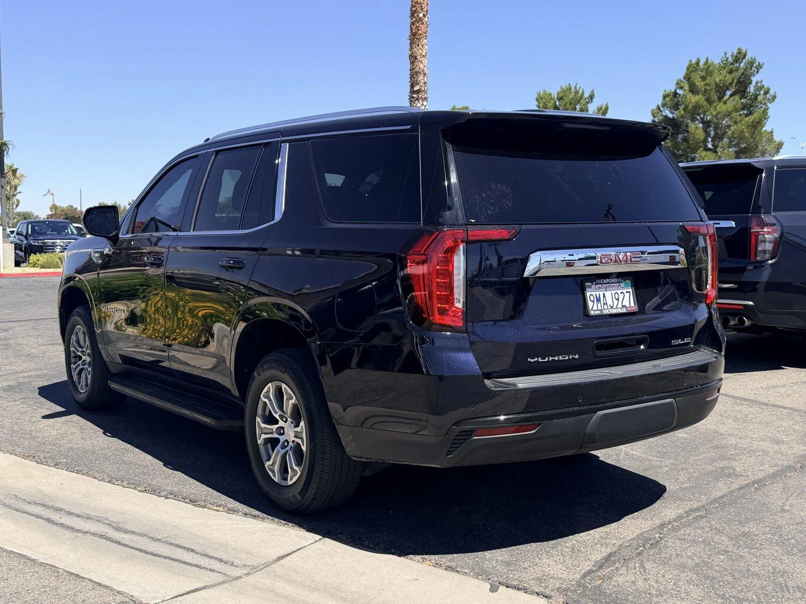 Used 2024 Midnight Blue Metallic GMC SLE image 4