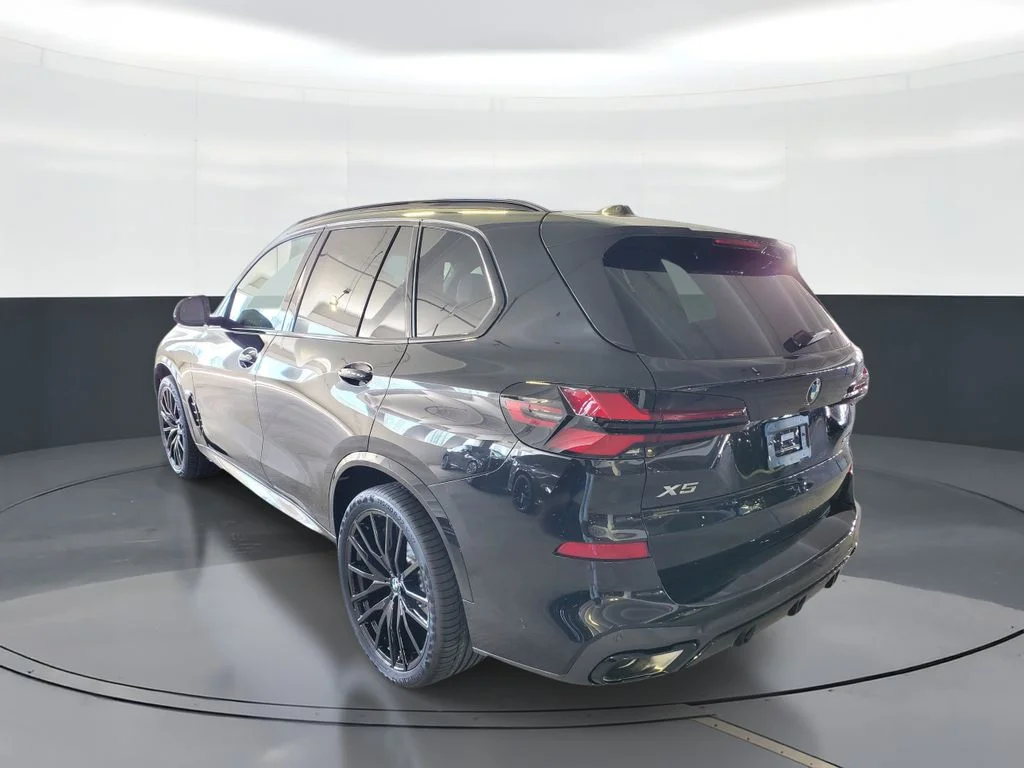 Used 2026 Black Sapphire Metallic BMW sDrive40i image 4